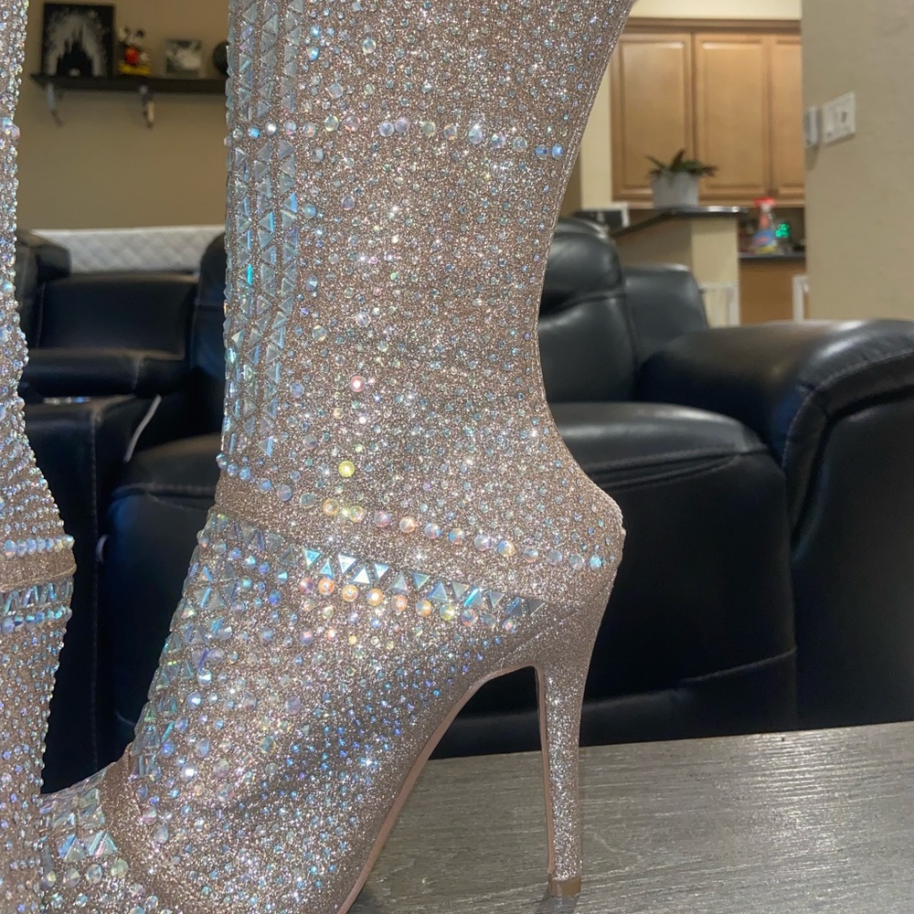 High Heeled boots. Never worn. Multiple sizes.